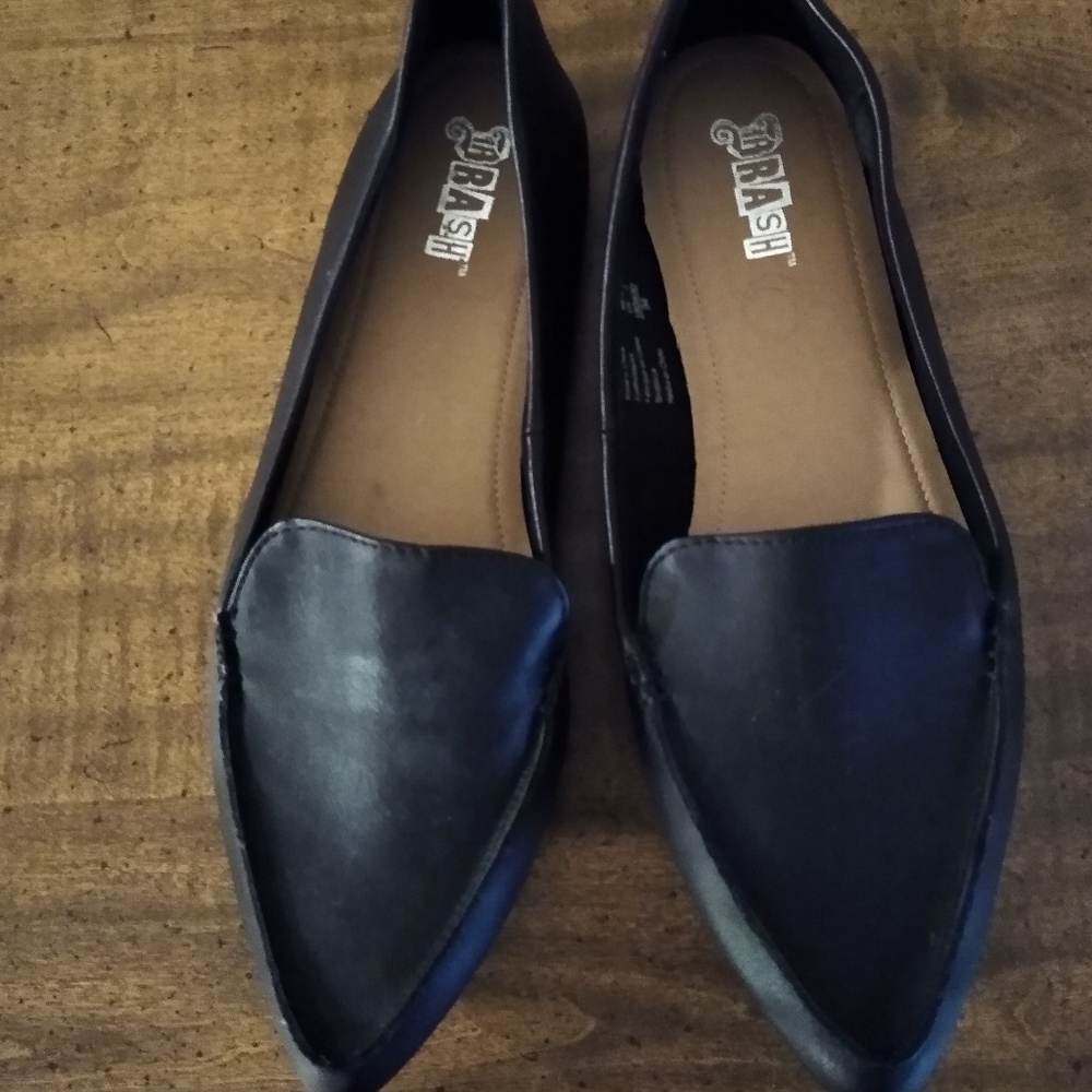 Black faux leather loafers.